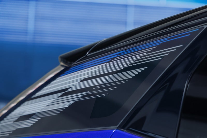 Close-up of the Modern Pattern on the 2026 OPTIQ-V Rear Quarter Glass | Dan Vaden Chevrolet Brunswick in Brunswick GA